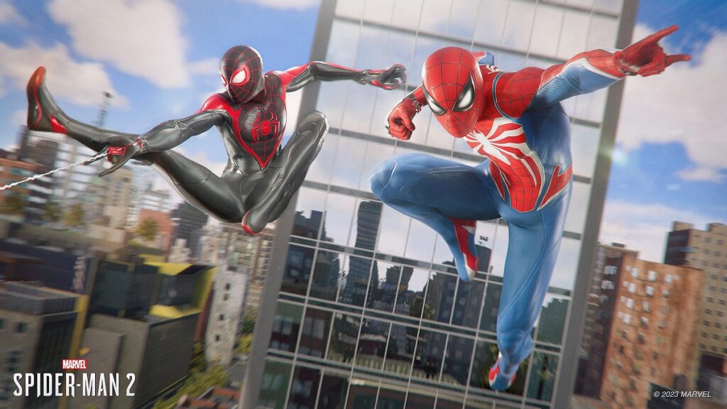 Miles Morales and Peter Parker flying through the air in front of the Manhatten skyline